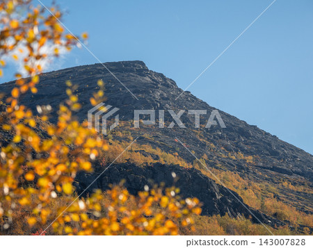 Majestic rocky mountain peak for outdoor climbing and hiking adventure Majestic rocky mountain peak for outdoor climbing and hiking adventure 143007828