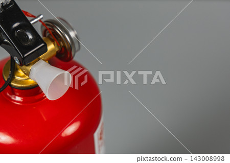 Fire extinguisher ready for use in emergency situations Fire extinguisher ready for use in emergency situations 143008998