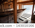 Viewing the sea from inside a boathouse in Ine 143010166