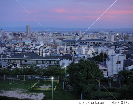 A park with a panoramic view of the city. A park with a panoramic view of the city. 143010172
