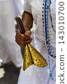 Hand of a woman in a white dress 143010700