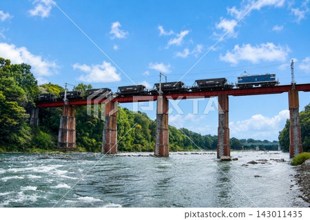 A Chichibu Railway freight train crosses the Arakawa River, a mecca for Nagatoro boating. A Chichibu Railway freight train crosses the Arakawa River, a mecca for Nagatoro boating. 143011435