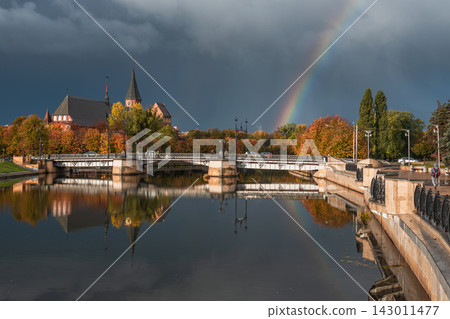 Autumn View of Konigsberg Cathedral and Rainbow in Kaliningrad. Russia Autumn View of Konigsberg Cathedral and Rainbow in Kaliningrad. Russia 143011477
