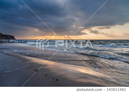 Donskoye beach at sunset of Baltic Sea. Kaliningrad region, Russia Donskoye beach at sunset of Baltic Sea. Kaliningrad region, Russia 143011481