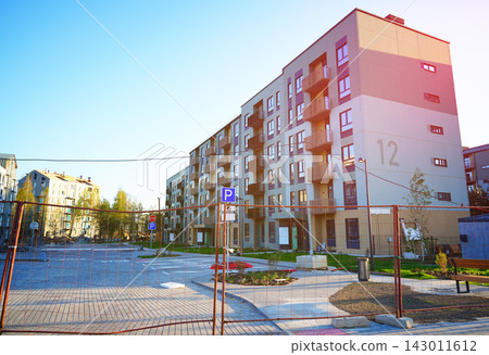 Completed of new residential development in new neighborhood. New build developments. Completed of new residential development in new neighborhood. New build developments. 143011612