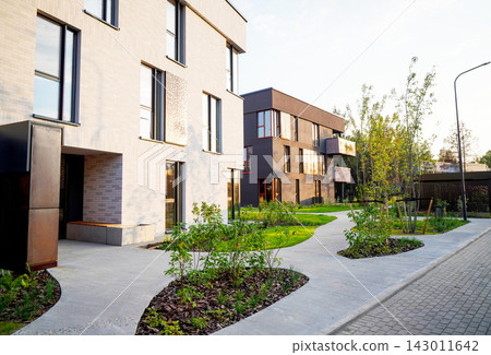 Modern contemporary apartment building. Premium urban villa development. Modern contemporary apartment building. Premium urban villa development. 143011642