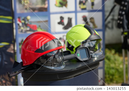 Firefighter Helmets With Visors and Thermal Camera Displayed as Fire Safety Protective Gear Firefighter Helmets With Visors and Thermal Camera Displayed as Fire Safety Protective Gear 143013255