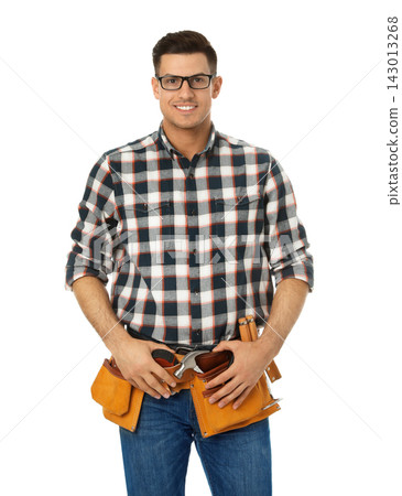 Handsome carpenter with tool belt isolated on white Handsome carpenter with tool belt isolated on white 143013268