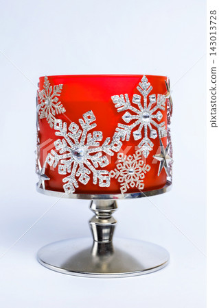 New Year's beautiful decorated snowflakes candlestick on a white background. New Year's beautiful decorated snowflakes candlestick on a white background. 143013728