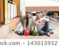 Happy family spending time together in bowling club 143013932