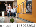 Happy family spending time together in bowling club 143013938