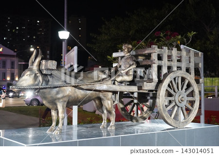 Traditional Ox Cart Statue Illuminated at Night in City Traditional Ox Cart Statue Illuminated at Night in City 143014051