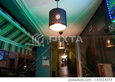 Modern Pendant Lights Illuminate Urban Alleyway Entrance Modern Pendant Lights Illuminate Urban Alleyway Entrance 143014073