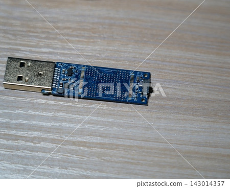 Detailed View of an Exposed USB Memory Stick Circuit Board Detailed View of an Exposed USB Memory Stick Circuit Board 143014357
