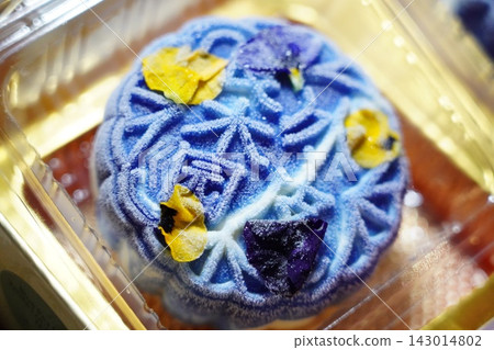 Elegant Blue Snowskin Mooncake with Edible Flowers Elegant Blue Snowskin Mooncake with Edible Flowers 143014802
