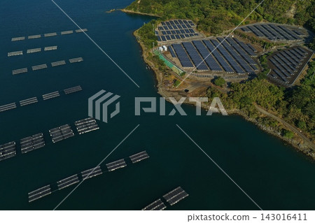Aerial photograph showing aquaculture rafts and solar panels in Uchinoumi, Naruto City, Tokushima Prefecture. Aerial photograph showing aquaculture rafts and solar panels in Uchinoumi, Naruto City, Tokushima Prefecture. 143016411