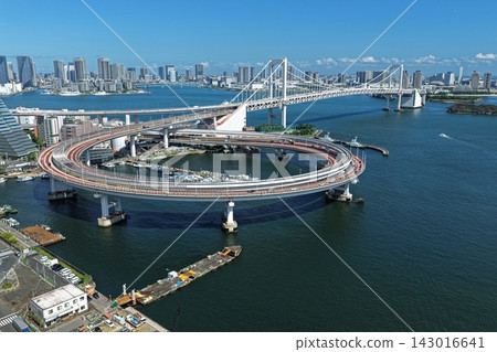 Aerial photograph capturing the Rainbow Bridge and Tokyo Bay area in Minato Ward. Aerial photograph capturing the Rainbow Bridge and Tokyo Bay area in Minato Ward. 143016641