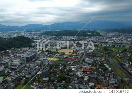 Aerial photograph capturing the city and river of Hitoyoshi, Kumamoto Prefecture. Aerial photograph capturing the city and river of Hitoyoshi, Kumamoto Prefecture. 143016732