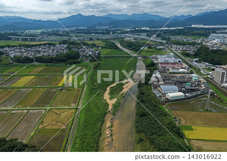 Aerial photographs capturing the rivers, fields, and residential areas of Kameyama City, Mie Prefecture. Aerial photographs capturing the rivers, fields, and residential areas of Kameyama City, Mie Prefecture. 143016922