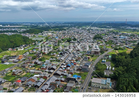 Aerial photograph capturing a residential area and solar panels in Kameyama City, Mie Prefecture. Aerial photograph capturing a residential area and solar panels in Kameyama City, Mie Prefecture. 143016958
