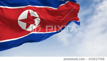 Close-up of North Korea national flag waving in the wind on a clear day 143017598