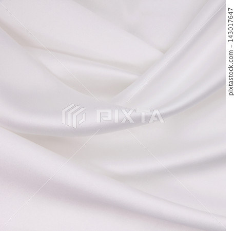Smooth elegant white silk or satin luxury cloth texture as wedding background. Luxurious background design Smooth elegant white silk or satin luxury cloth texture as wedding background. Luxurious background design 143017647