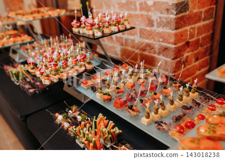 Elegant catering buffet with assorted gourmet appetizers and canapes Elegant catering buffet with assorted gourmet appetizers and canapes 143018238
