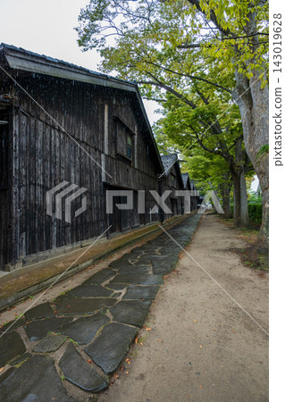 Mountain dwelling warehouses, wet with light rain in early autumn. Mountain dwelling warehouses, wet with light rain in early autumn. 143019628
