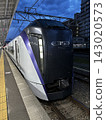 The nighttime Limited Express Azusa (E353 series) stopped at Matsumoto Station. 143020573