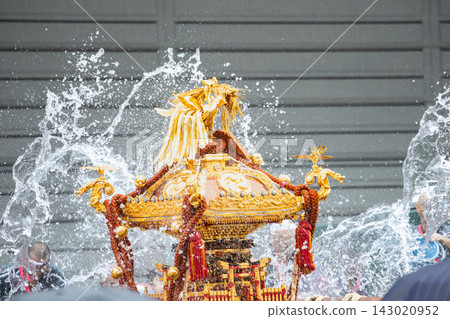 Portable shrine at the Tomioka Hachimangu Shrine's annual water-throwing festival. Portable shrine at the Tomioka Hachimangu Shrine's annual water-throwing festival. 143020952