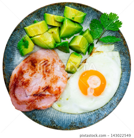 Fried egg and sausage slice complemented by avocado Fried egg and sausage slice complemented by avocado 143022549