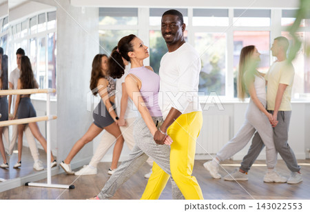 Adult man and woman dancing latin dances Adult man and woman dancing latin dances 143022553