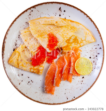 Pancakes with red caviar and salted salmon - hearty lunch 143022778