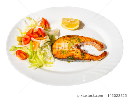 Salmon steak with fresh vegetable salad on plate Salmon steak with fresh vegetable salad on plate 143022823