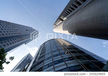 Singapore CBD Modern Skyscrapers Viewed From Below Against Clear Blue Sky Singapore CBD Modern Skyscrapers Viewed From Below Against Clear Blue Sky 143024005