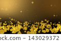 A gold background with sparkling balls of light. 143029372