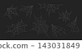 A set of spider webs against a black background 143031849