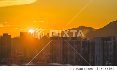 Hong Kong, July 10 2026 Sunset Illuminating Dense Urban Skyline 143033168