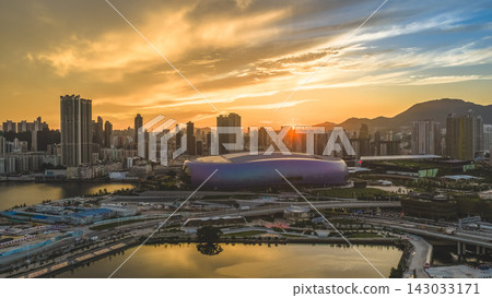 Hong Kong, July 10 2026 Golden Sunset Above Kai Tak Sports Park Skyline Hong Kong, July 10 2026 Golden Sunset Above Kai Tak Sports Park Skyline 143033171