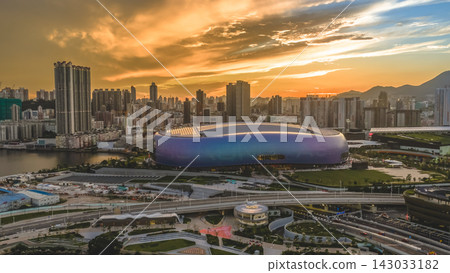 Hong Kong, July 10 2026 Kai Tak Sports Park Under Dramatic Golden Sunset Hong Kong, July 10 2026 Kai Tak Sports Park Under Dramatic Golden Sunset 143033182