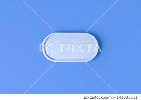 Podium for cosmetic product presentation. Abstract minimal geometrical form on blue background. Oval stone form. Scene, Showcase, display. Minimal design. Soft shadow. Flat lay, Top View. Copy space Podium for cosmetic product presentation. Abstract minimal geometrical form on blue background. Oval stone form. Scene, Showcase, display. Minimal design. Soft shadow. Flat lay, Top View. Copy space 143033511