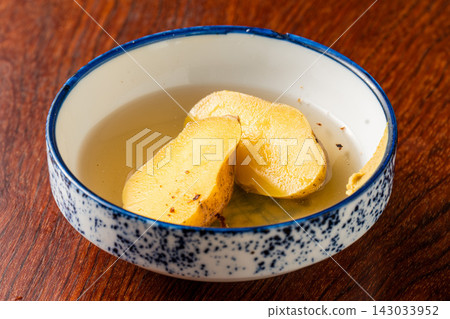 Sweet and fluffy Inca's Awakening potatoes in oden Sweet and fluffy Inca's Awakening potatoes in oden 143033952