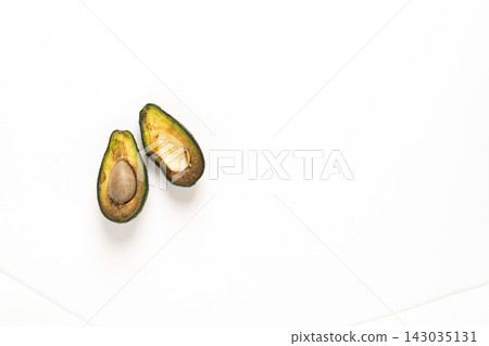 Spoiled rotten fruit vegetables avocado white background. Top view copy space Spoiled rotten fruit vegetables avocado white background. Top view copy space 143035131