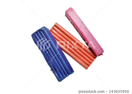 Three sticks of classic colored modeling clay. Three sticks of classic colored modeling clay. 143035950