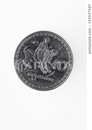 Unique silver coin featuring a lion design, showcasing intricate details and cultural significance from its country of origin Unique silver coin featuring a lion design, showcasing intricate details and cultural significance from its country of origin 143037487