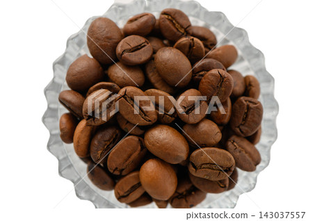 Overhead Close-Up View of Roasted Coffee Beans in a Crystal Bowl Overhead Close-Up View of Roasted Coffee Beans in a Crystal Bowl 143037557