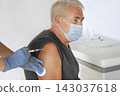 Doctor Vaccinating Senior Man In Clinic. Older People Vaccination. Doctor Giving Monkeypox or COVID Vaccine Injection to Mature Man In Face Mask. Protection of Elderly Patient. Old Man in Hospital 143037618