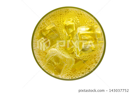 Top-Down View of a Glass Filled with Yellow Soda and Ice Cubes Top-Down View of a Glass Filled with Yellow Soda and Ice Cubes 143037752