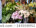 Stalls with flowers and bouquets at local street market 143038952
