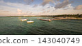 Pier and boat moored at sunrise over the Caribbean sea in Playa del Carmen 143040749